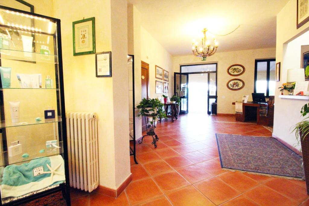 Postel nebo postele na pokoji v ubytování La Loggia - Villa Gloria -Adults Only