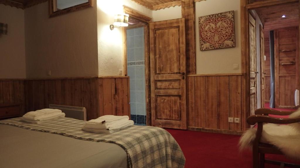 Postel nebo postele na pokoji v ubytování Ancolies Val Thorens
