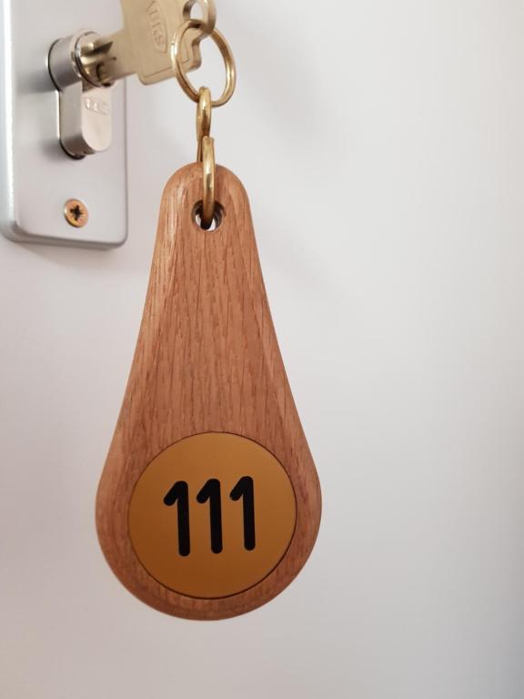a key chain with the number on it at Hotel-Residenz Oberurseler Hof in Oberursel