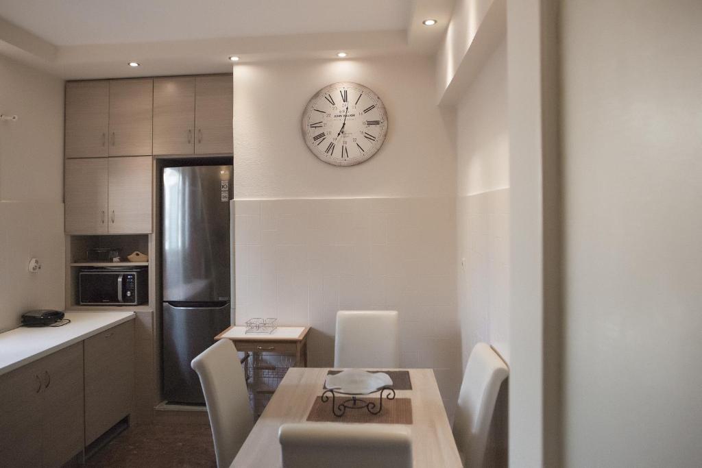 Kuchyň nebo kuchyňský kout v ubytování Corfu City Apartments