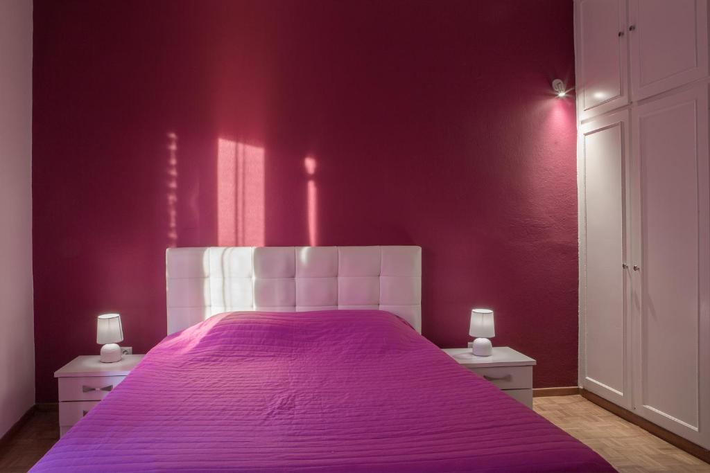 Postel nebo postele na pokoji v ubytování Corfu City Apartments