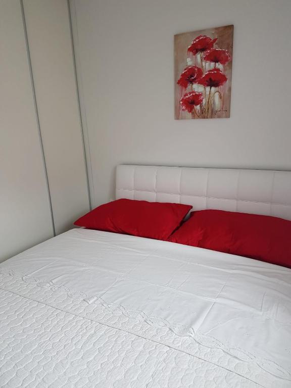 Posteľ alebo postele v izbe v ubytovaní Apartment Dijana