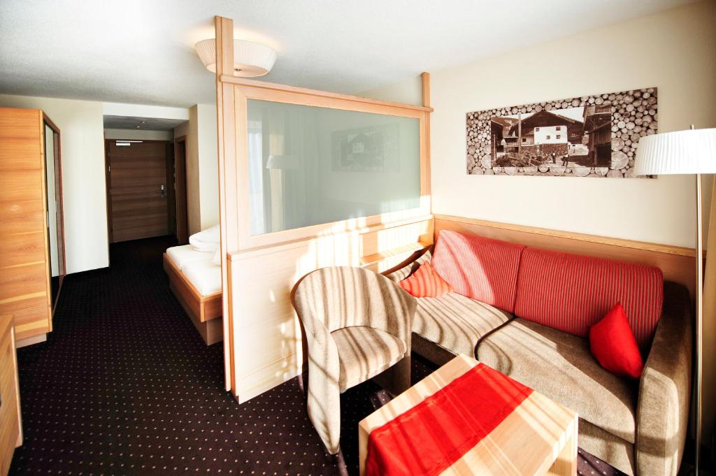 Postel nebo postele na pokoji v ubytování Hotel Röck Garni