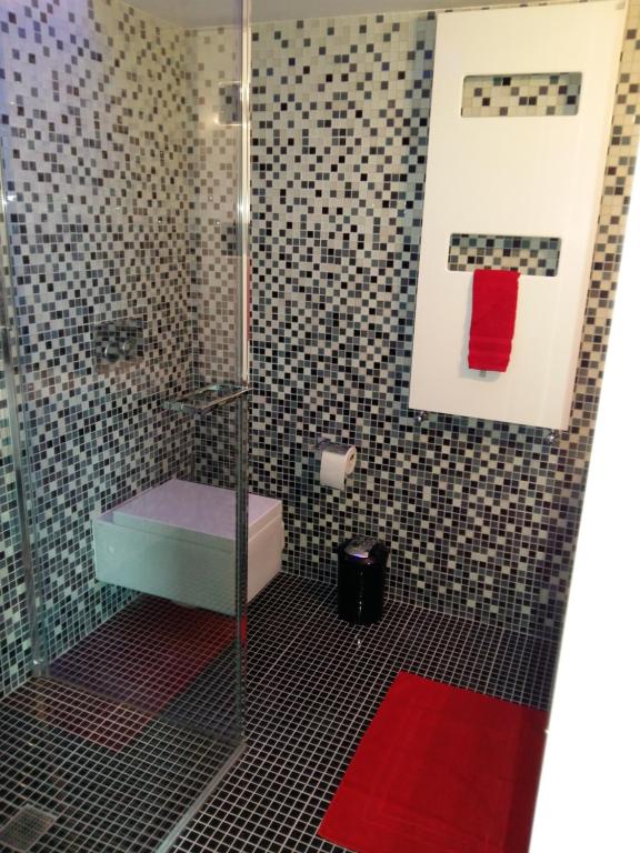 Koupelna v ubytování Le Manoir de Champlan