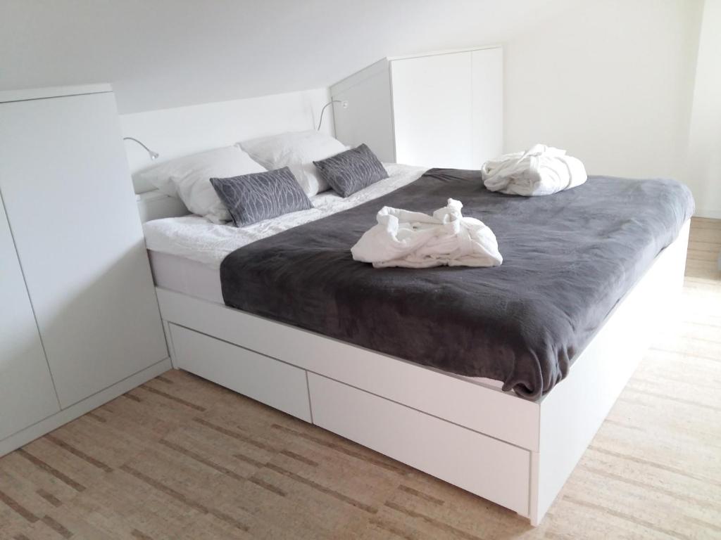 Postel nebo postele na pokoji v ubytování Le Manoir de Champlan