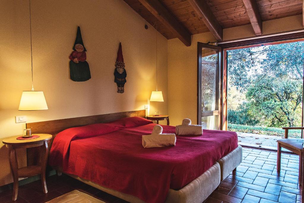 Postel nebo postele na pokoji v ubytování Corte San Mattia