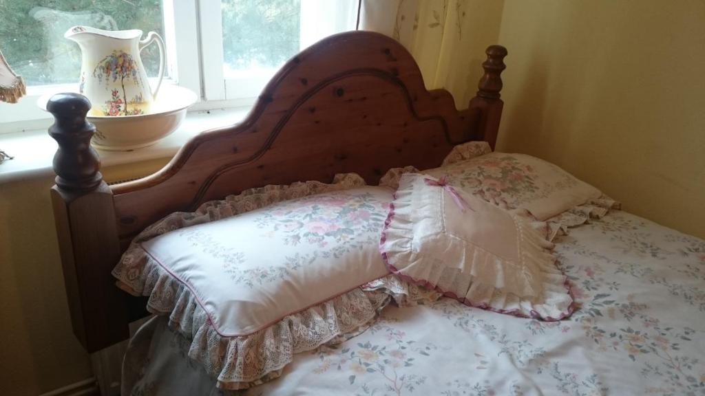 Postel nebo postele na pokoji v ubytování Willa Zamkowisko