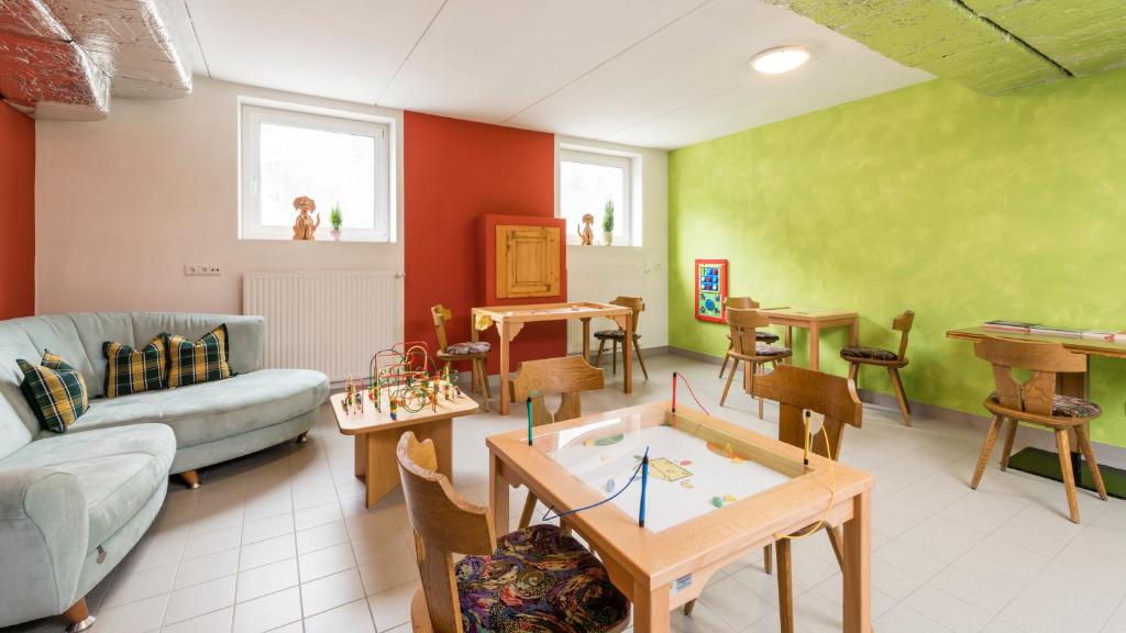 Posezení v ubytování B&B Hotel Alpenrose Rooms & Apartments