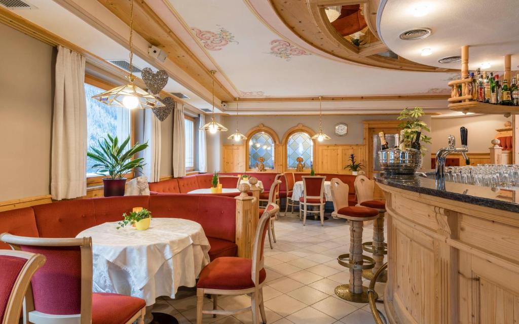 Posezení v ubytování B&B Hotel Alpenrose Rooms & Apartments