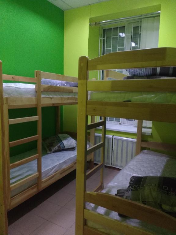 Postel nebo postele na pokoji v ubytování Yourhostel Дорогожичи
