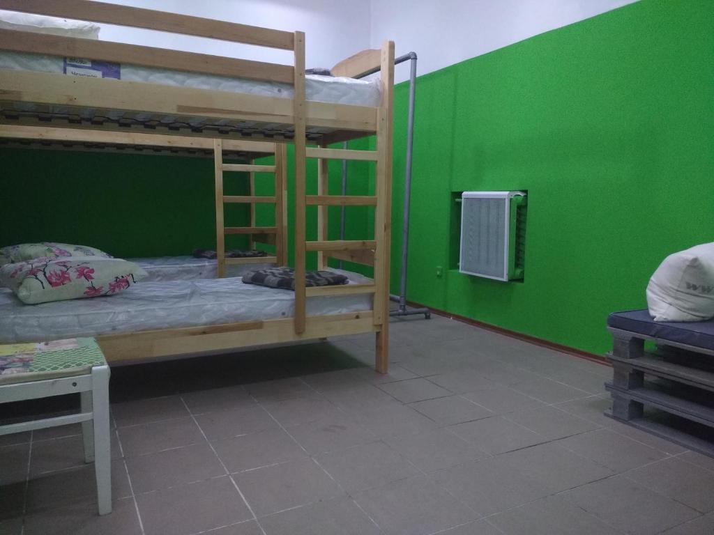 Postel nebo postele na pokoji v ubytování Yourhostel Дорогожичи