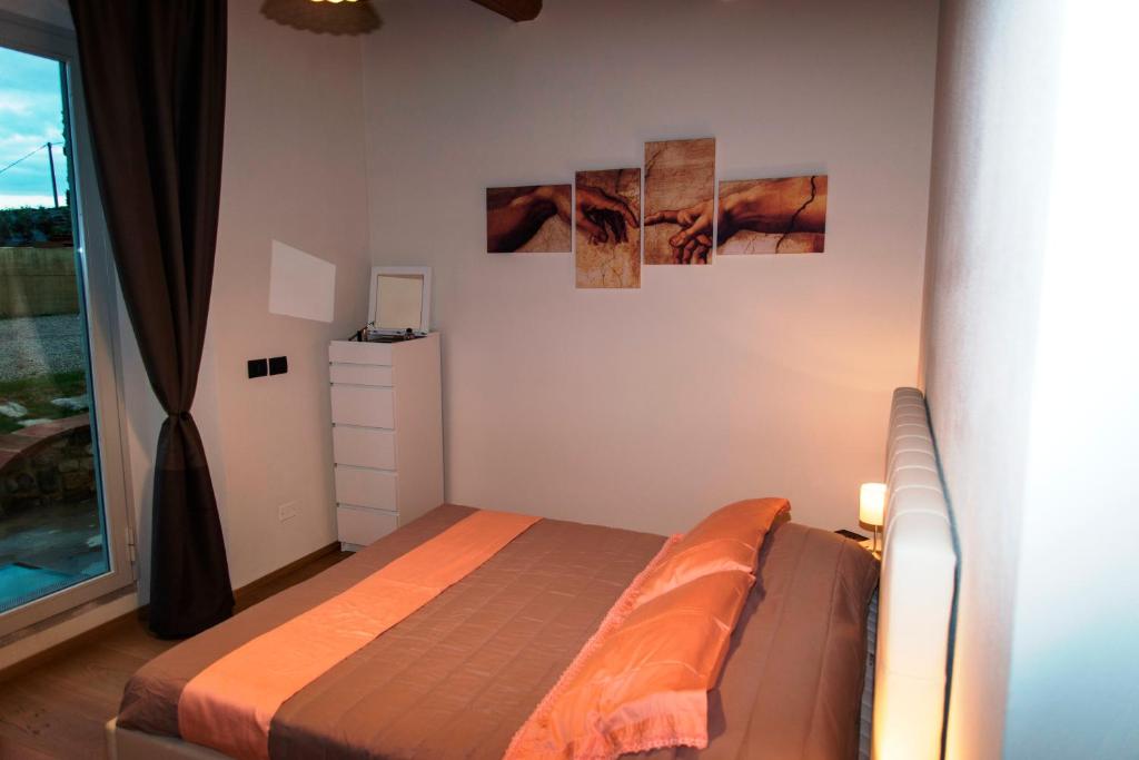 A bed or beds in a room at Villa la torre