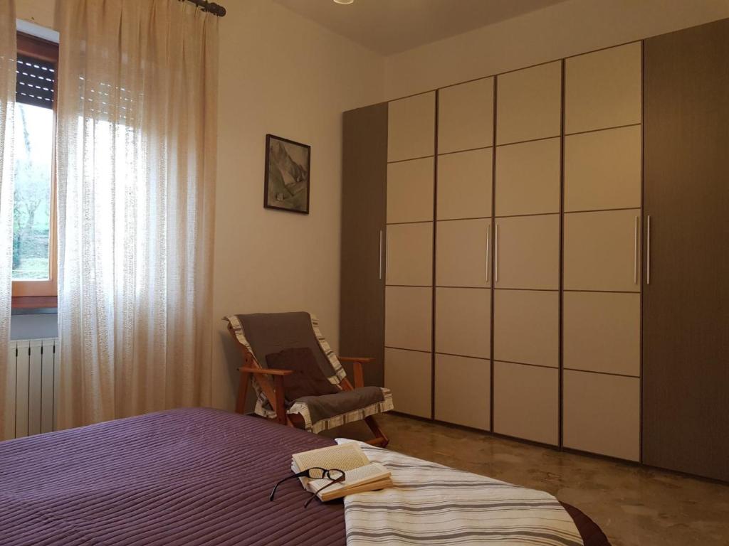 Postel nebo postele na pokoji v ubytování Villa Lorenzo primo piano