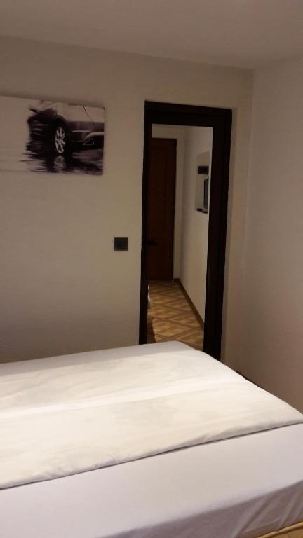 Postel nebo postele na pokoji v ubytování Banya Guest Rooms 23