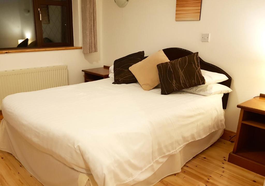 Postel nebo postele na pokoji v ubytování Ely House B&B