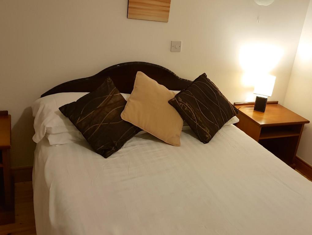 Postel nebo postele na pokoji v ubytování Ely House B&B