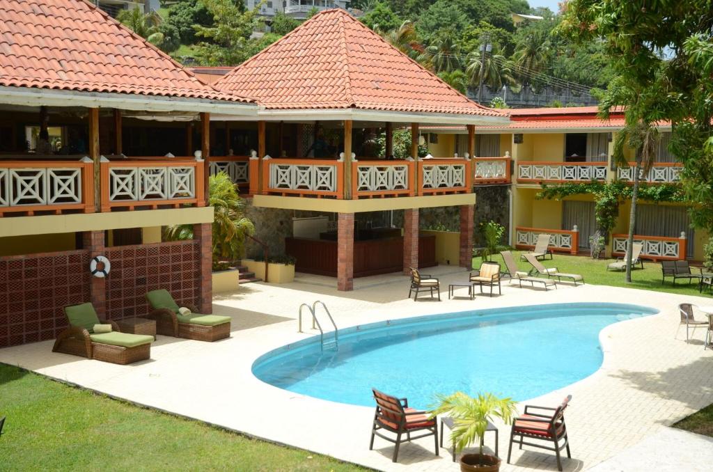 an image of a resort with a swimming pool at Sunset Shores Beach Hotel in Kingstown