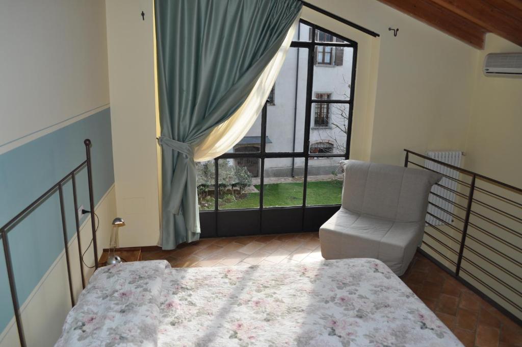 Postel nebo postele na pokoji v ubytování Le Quattro Stagioni B&B and Apartament