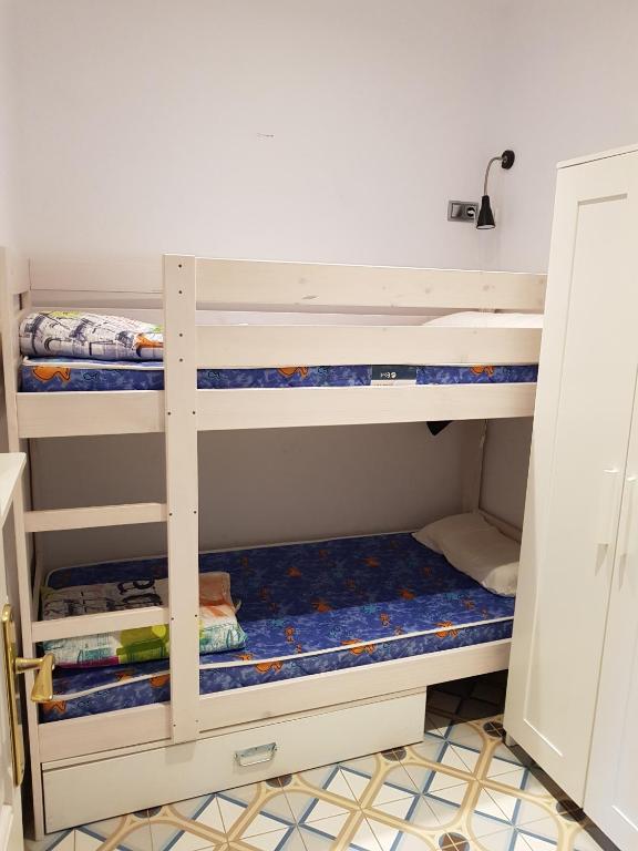 Postel nebo postele na pokoji v ubytování Apartamentos Nouvilas