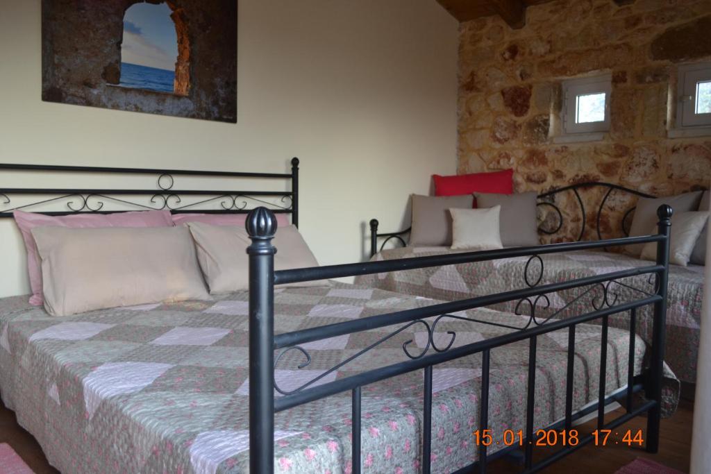 Postel nebo postele na pokoji v ubytování Rumpis Traditional House