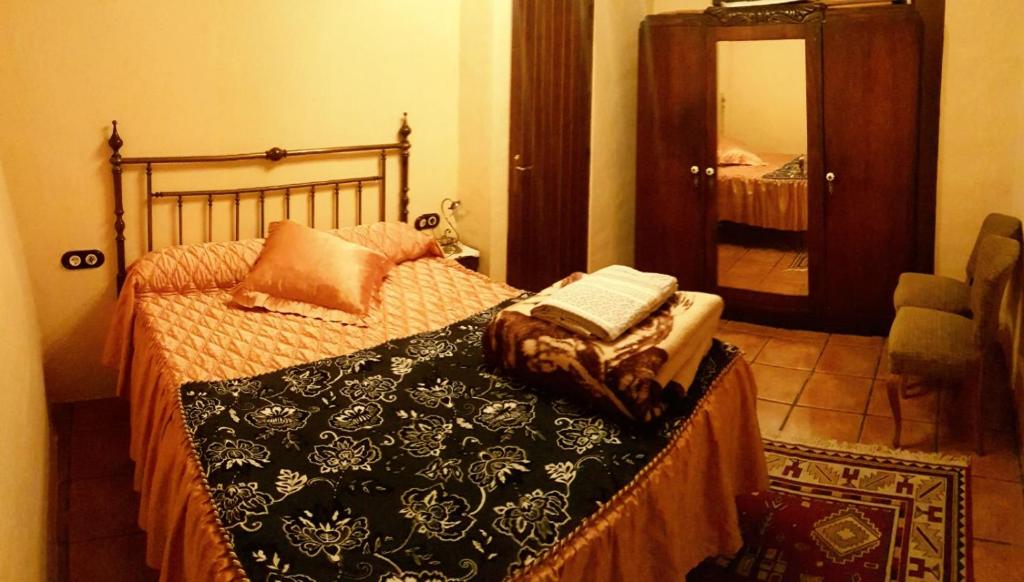 Postel nebo postele na pokoji v ubytování Casa Francisco Teruel