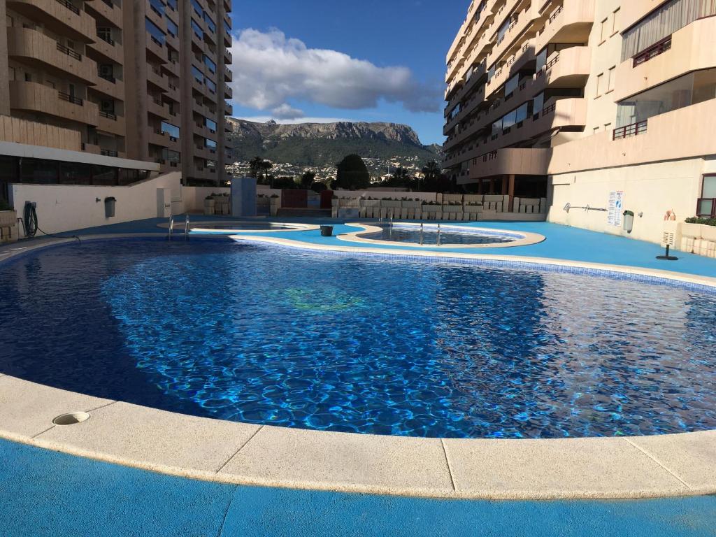 Bazén v ubytovaní Apartamento en Calpe, playa de La Fossa, primera línea, AA alebo v jeho blízkosti