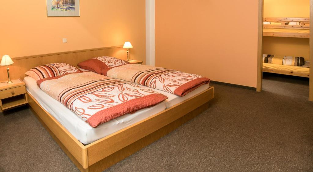 Postel nebo postele na pokoji v ubytování Apartmenthaus Weber