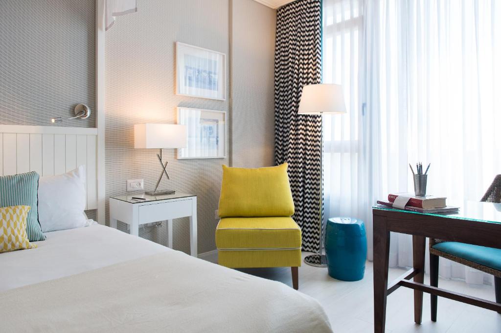 Postel nebo postele na pokoji v ubytování Melody Hotel - an Atlas Boutique Hotel