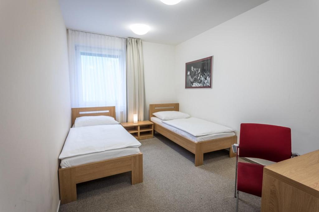 Postel nebo postele na pokoji v ubytování Sareza hotel
