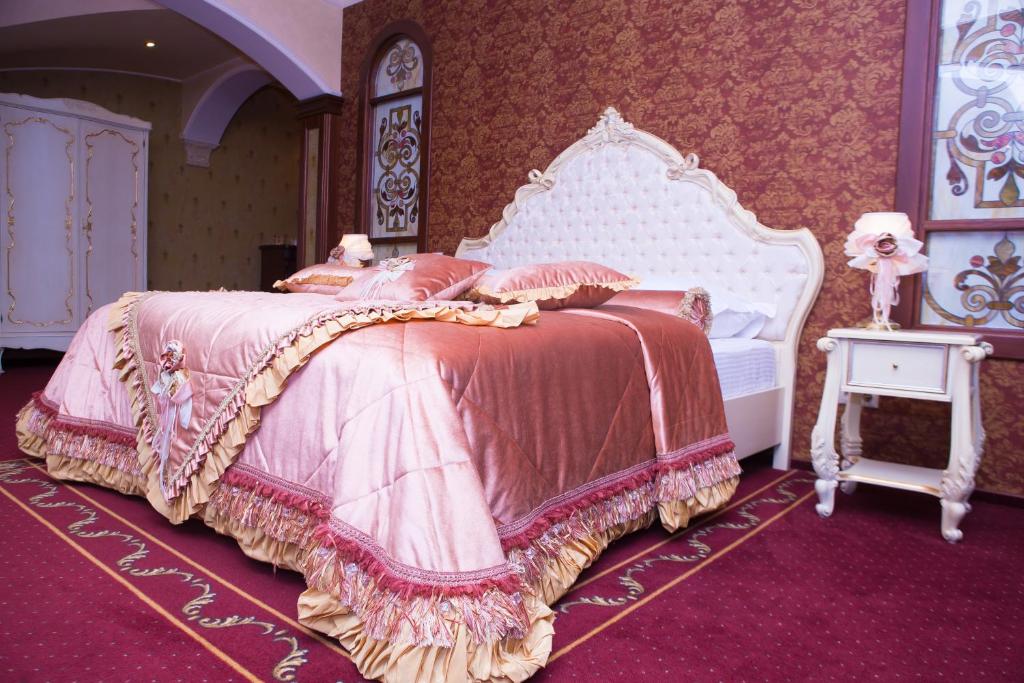 Postel nebo postele na pokoji v ubytování Hotel Elefant