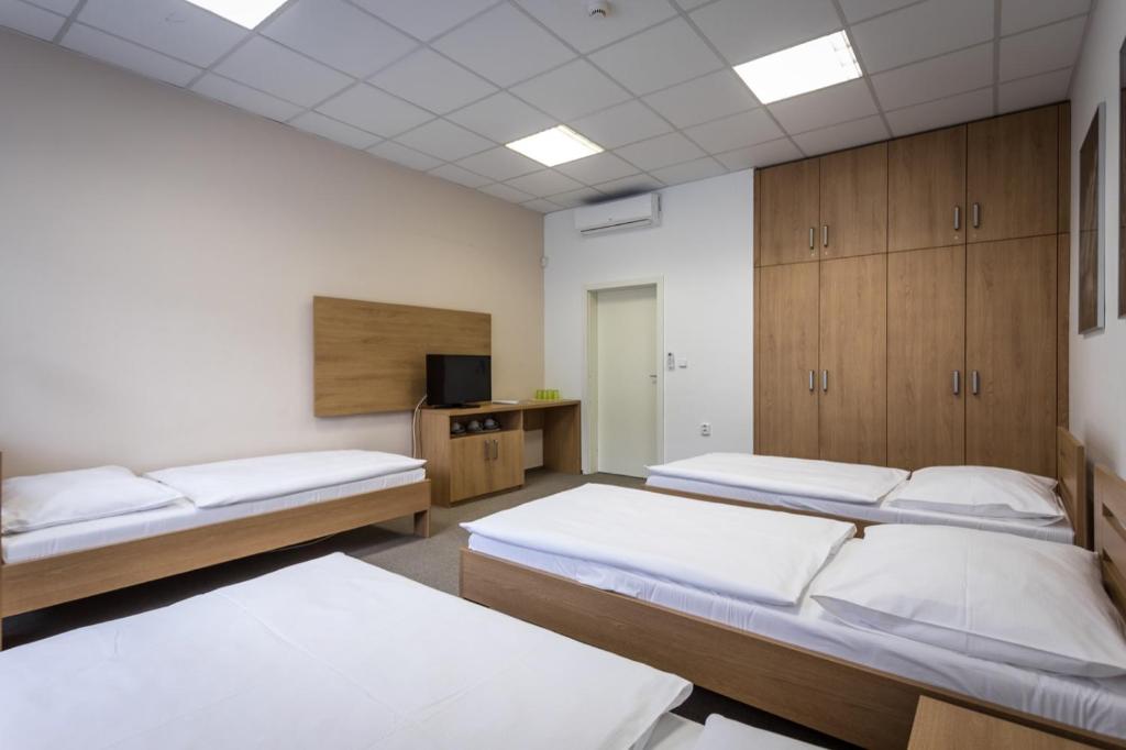 Postel nebo postele na pokoji v ubytování Sareza hotel