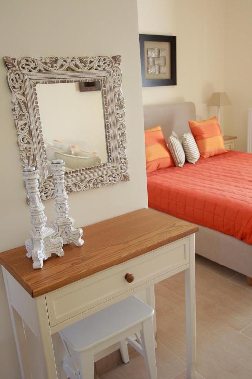 Кровать или кровати в номере Elaion mini suites