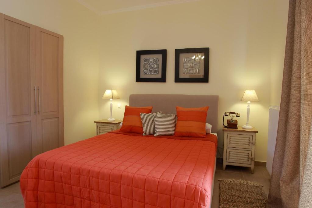 Кровать или кровати в номере Elaion mini suites
