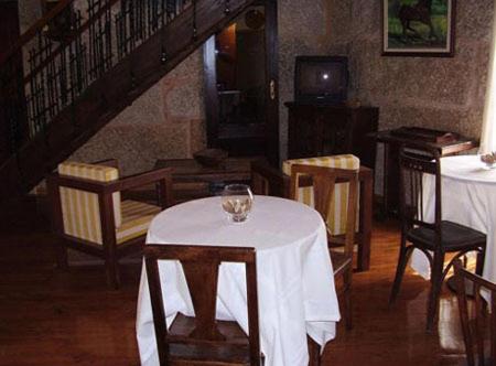 Televízia a/alebo spoločenská miestnosť v ubytovaní Casa dos Ulloa
