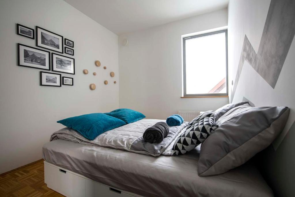 Postel nebo postele na pokoji v ubytování Krona Apartments