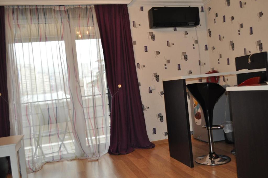 TV a/nebo společenská místnost v ubytování Hotel Your Comfort