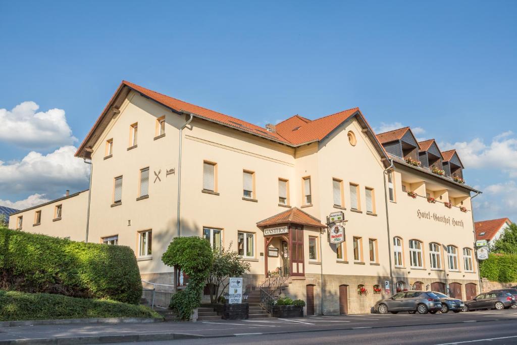 a large building on the side of a street at Gasthof-Hotel Harth in Fulda