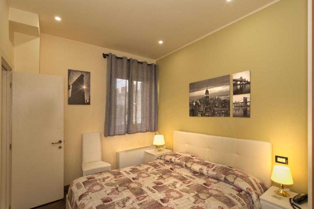 Postel nebo postele na pokoji v ubytování Hotel Il Giardino