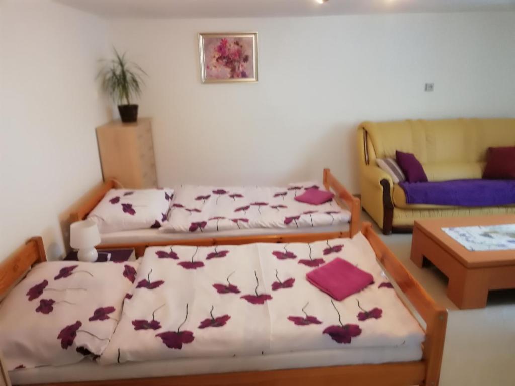 Postel nebo postele na pokoji v ubytování Domino