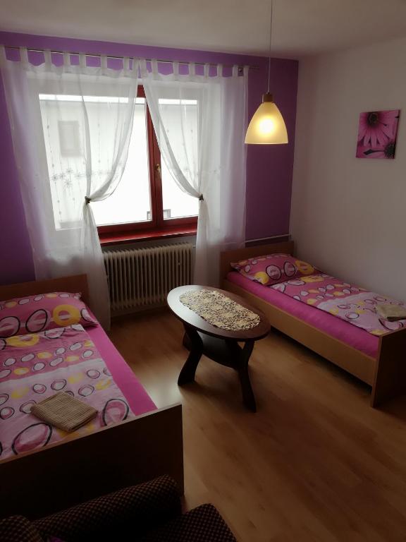 Postel nebo postele na pokoji v ubytování Domino