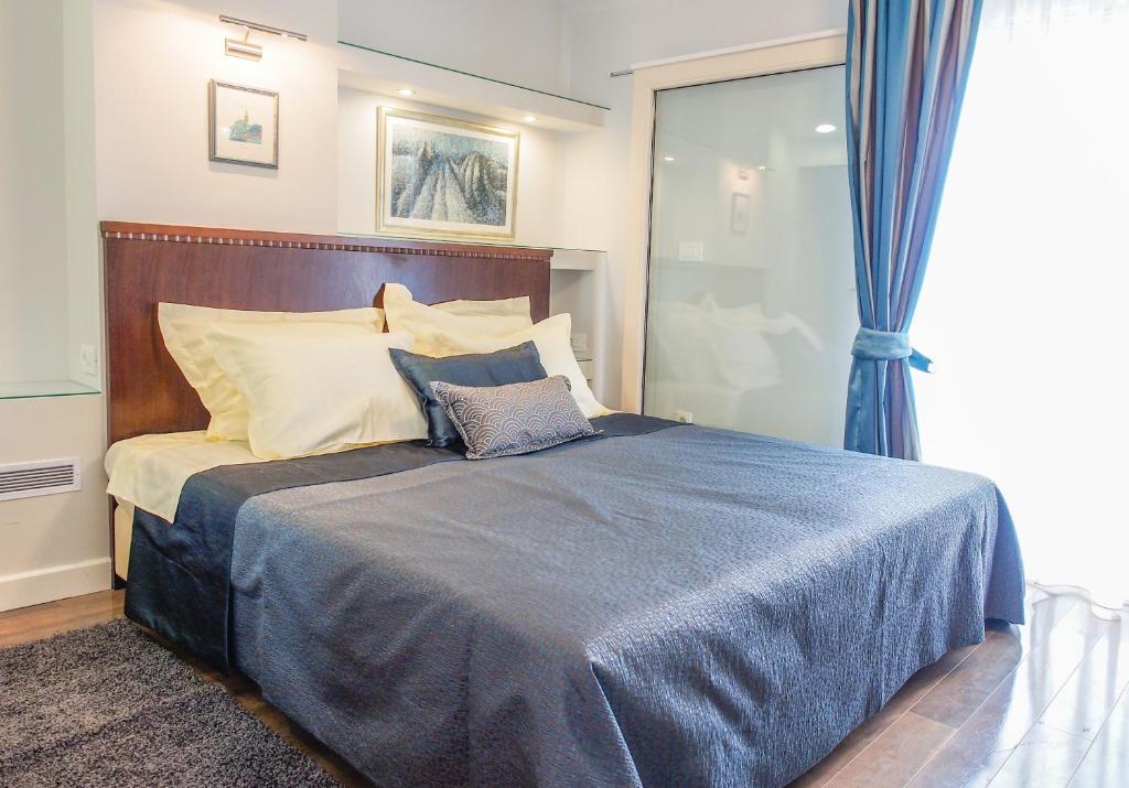 Кровать или кровати в номере DeVecchi rooms