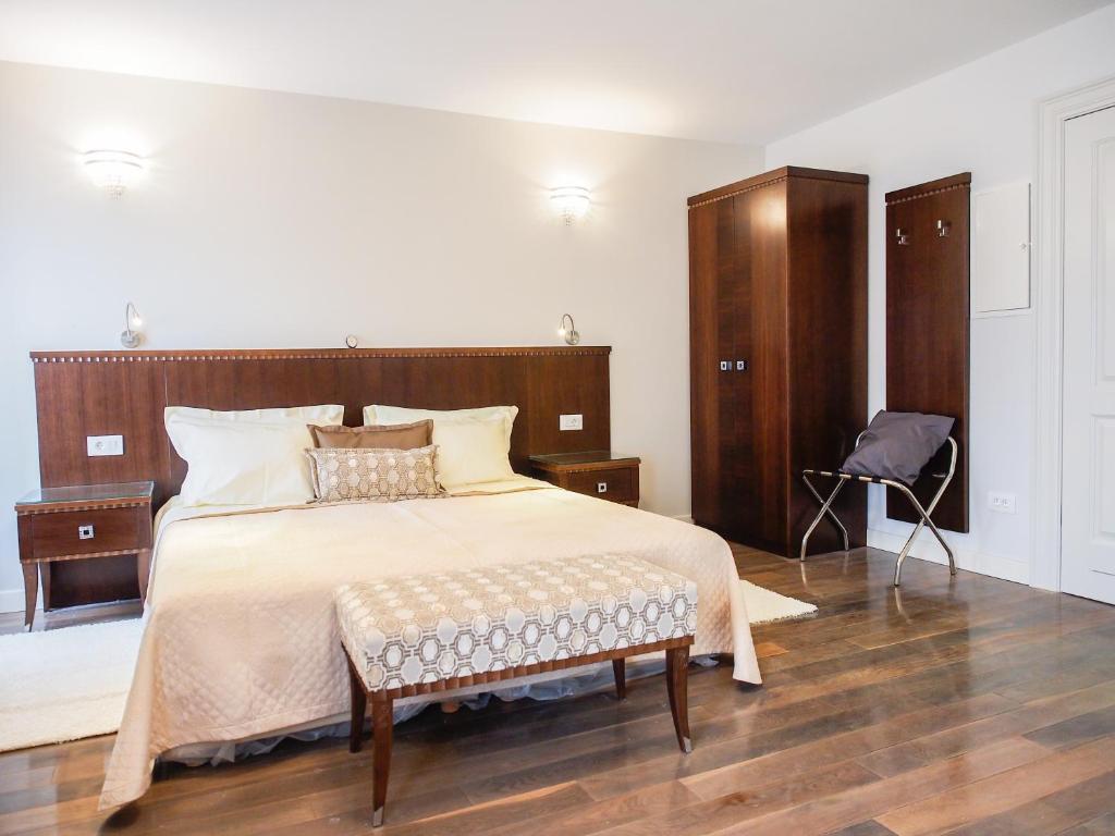 Postel nebo postele na pokoji v ubytování DeVecchi rooms