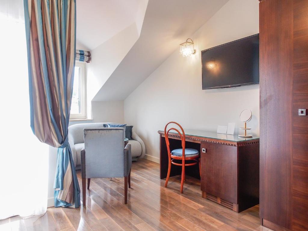 TV a/nebo společenská místnost v ubytování DeVecchi rooms