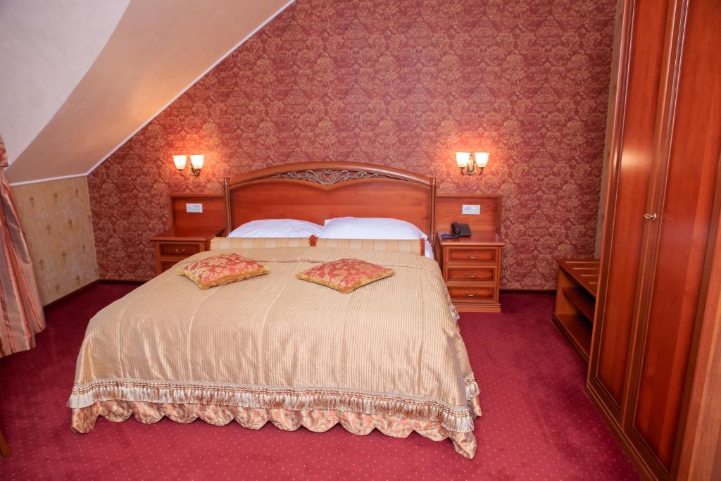Postel nebo postele na pokoji v ubytování Hotel Elefant