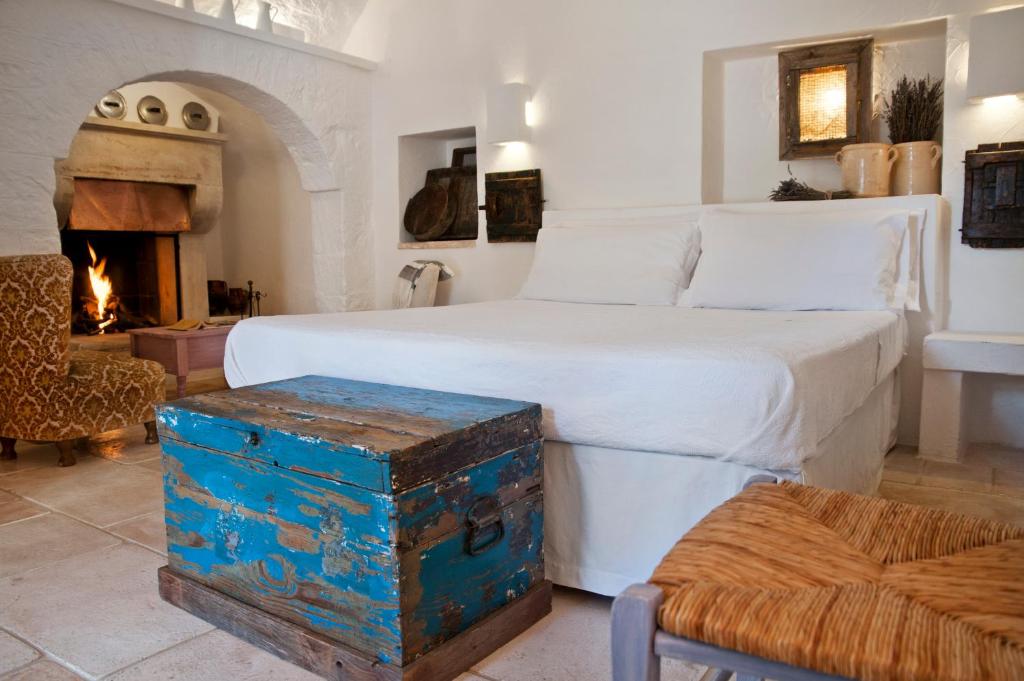 Postel nebo postele na pokoji v ubytování Masseria Salinola