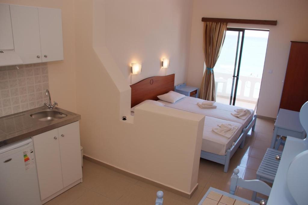 Letto o letti in una camera di Mandy Suites