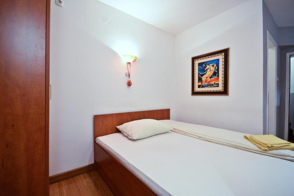 Postel nebo postele na pokoji v ubytování Apartments Imper - IMD