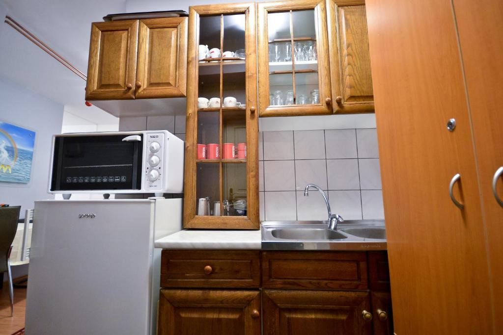 Kuchyň nebo kuchyňský kout v ubytování Apartments Imper - IMD