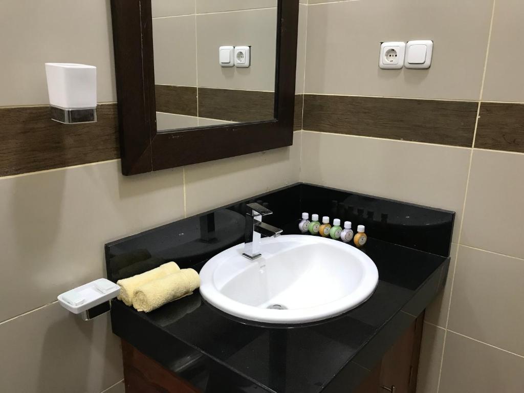 Koupelna v ubytování Hotel 4 U Saliya Garden