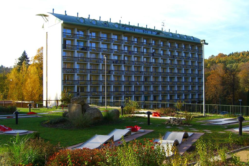 a large building with a park in front of it at Spa Resort Libverda - Hotel Nový Dům in Lázně Libverda